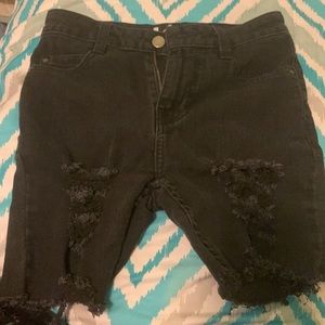 A black ripped shorts
